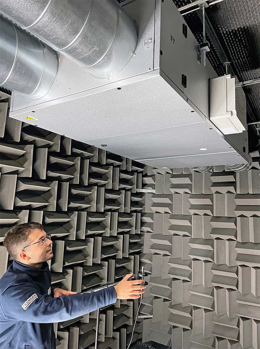 Image showing a Frenger engineer testing the Standard MVHR unit inside an acoustic laboratory MVHR Testing